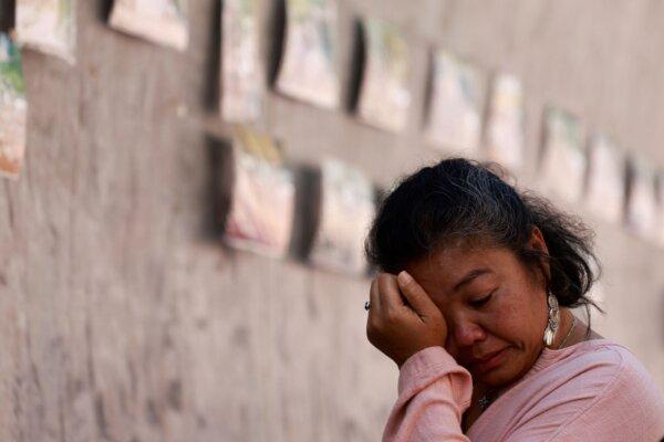 A relative of a victim of a 2004 Indian Ocean tsunami shows an expression during its 20th anniversary at Tsunami Memorial Park at Ban Nam Khem, Takuapa district of Phang Nga Province, southern Thailand, on Dec. 26, 2024. (Wason Wanichakorn/AP Photo)
