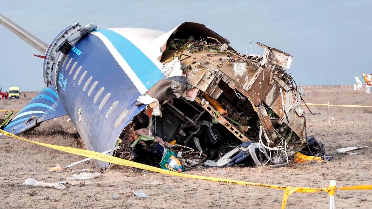 The wreckage of Azerbaijan Airlines Embraer 190 lies on the ground near the airport of Aktau, Kazakhstan, on Dec. 25, 2024, in a still from video. (The Administration of Mangystau Region via AP)