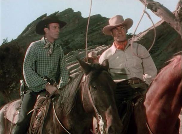Rancher Inskip (Charley Grapewin, L) and Brazos Kane (Randolph Scott), face trouble on the range, in “Gunfighters.” (Columbia Pictures).