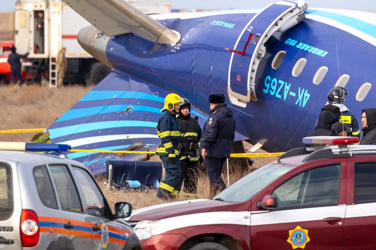 Emergency teams at the crash site of an Azerbaijan Airlines passenger jet near Aktau, Kazakhstan, on Dec. 25, 2024. (Issa Tazhenbayev/AFP via Getty Images)