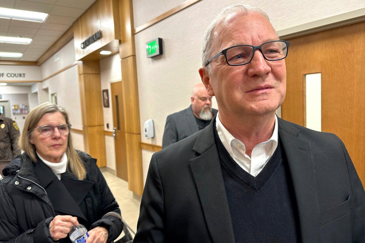 Sen. Kevin Cramer (R-N.D.) speaks to reporters as his wife Kris Cramer (L) looks on after the sentencing of his son Ian Cramer at the Mercer County Courthouse in Stanton, N.D., on Dec. 30, 2024. (Jack Dura/AP Photo)