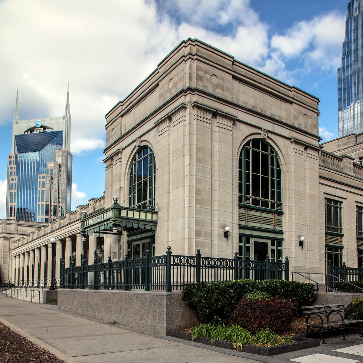A view of the stage door at the rear of Schermerhorn. The passionflower, Tennessee's state wildflower, is depicted on the keystones above the building's arched windows. (Public Domain)