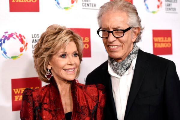 Jane Fonda, (L), and Richard Perry pose for a photo at the Hyatt Regency Century Plaza in Los Angeles, Calif., on Nov. 7, 2015. (Chris Pizzello/Invision/AP Photo)