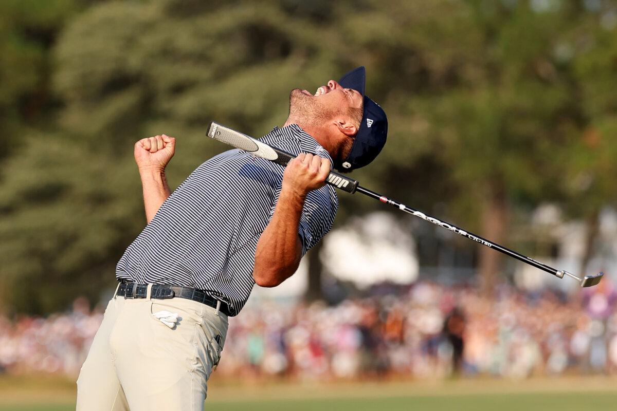 Bryson DeChambeau of the United States celebrates putting on the 18th green to win during the final round of the 124th U.S. Open at Pinehurst Resort in Pinehurst, N.C., on June 16, 2024. (Gregory Shamus/Getty Images)