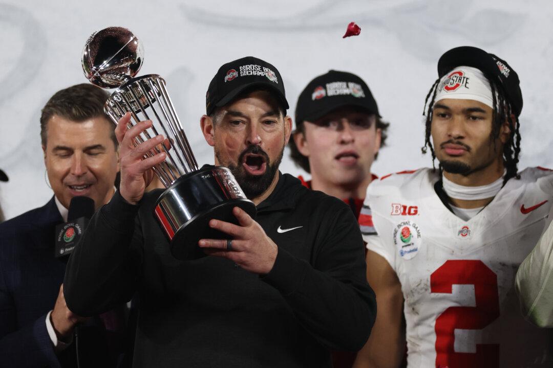 Coach Ryan Day Proud as Ohio State Overwhelms Oregon, Set Sights on Playoff