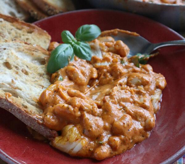 This Skillet Tomato Cheddar Basil Beans Recipe Will Warm Your Winter Bones