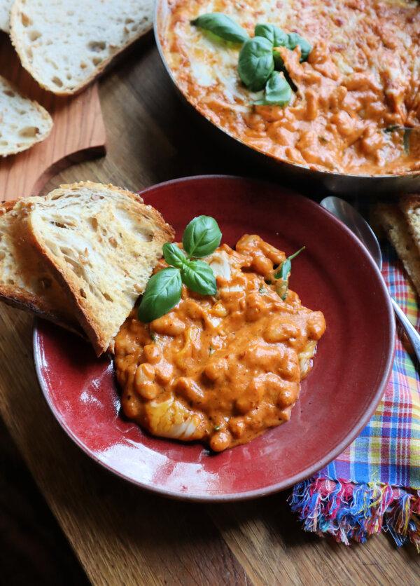 This cheesy bean dish is made in one pan and is best served with bread for scooping. (Gretchen McKay/Pittsburgh Post-Gazette/TNS)