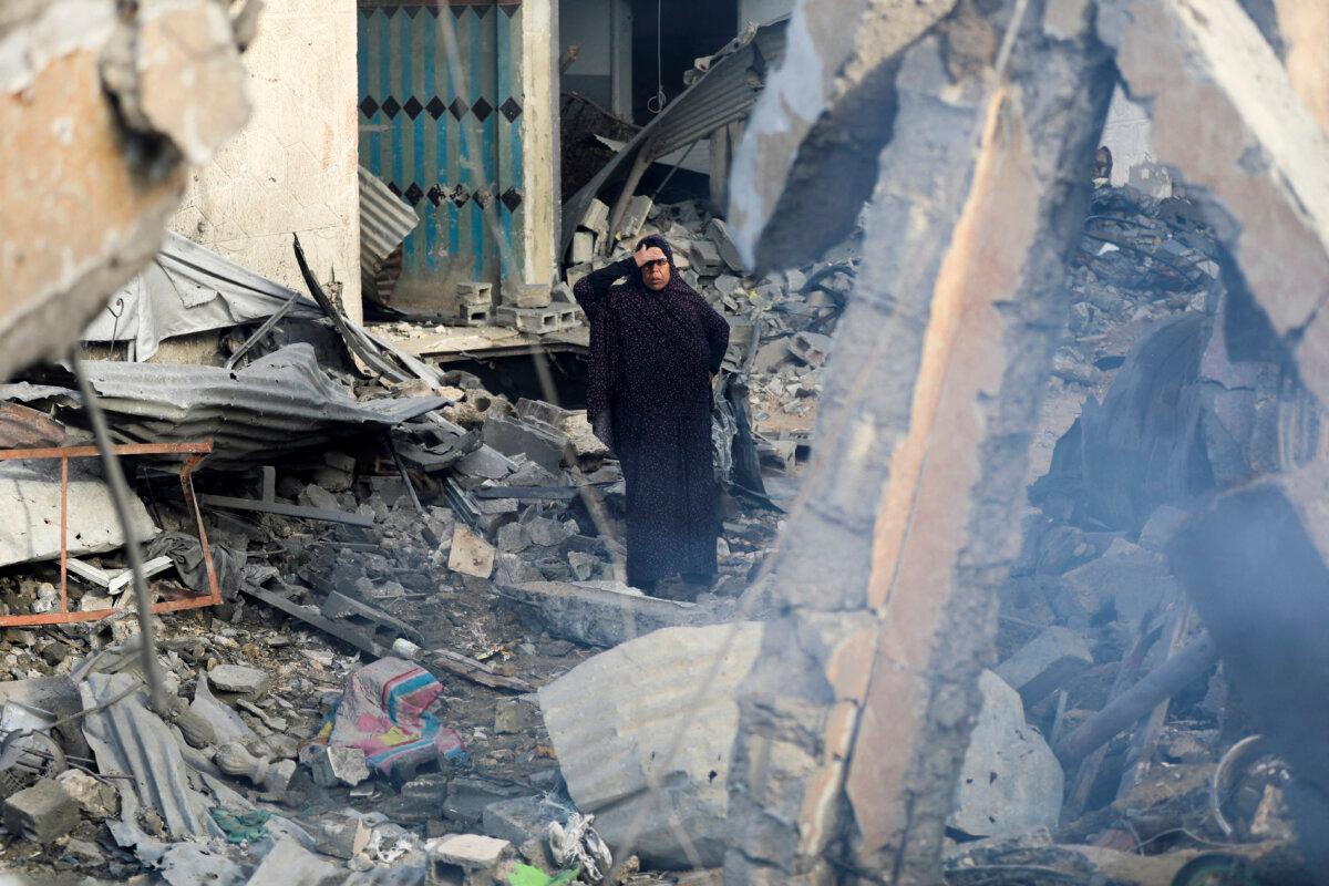 A Palestinian woman reacts at the site of an Israeli strike on a house, amid the ongoing conflict between Israel and Hamas, in Gaza City on Jan. 4, 2025. (Dawoud Abu Alkas/Reuters)