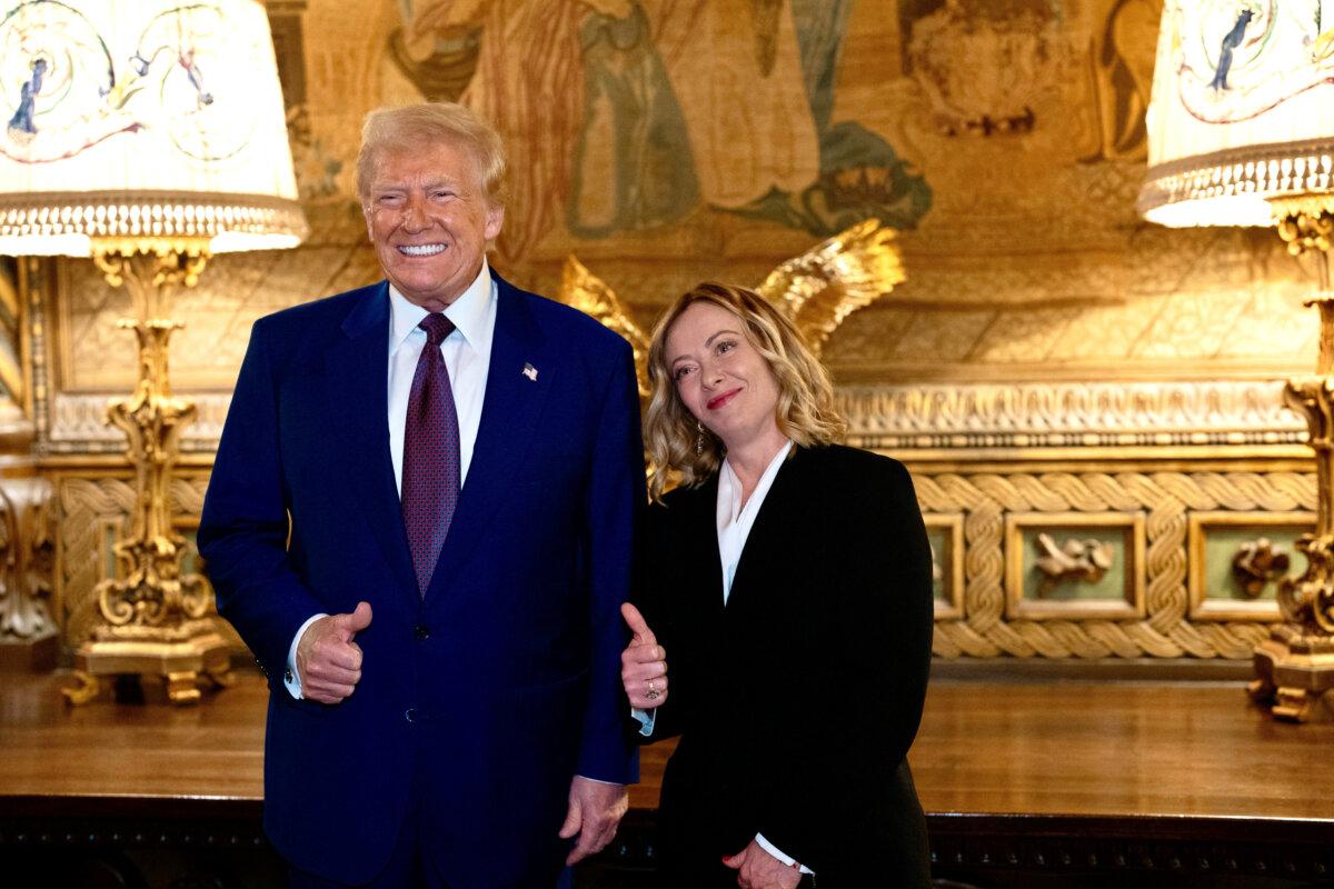 U.S. President-elect Donald Trump (L) meets with Italian Prime Minister Giorgia Meloni at Mar-a-Lago in Palm Beach, Fla., on Jan. 4, 2025. (Italian Government/Handout via Reuters)