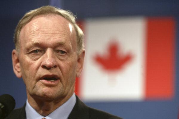 Canadian Prime Minister Jean Chrétien speaks to the press after a working session on the second day of the Group of Eight (G8) summit in Évian-les-Bains, France, on June 2, 2003. (Gabriel Bouys/AFP via Getty Images)