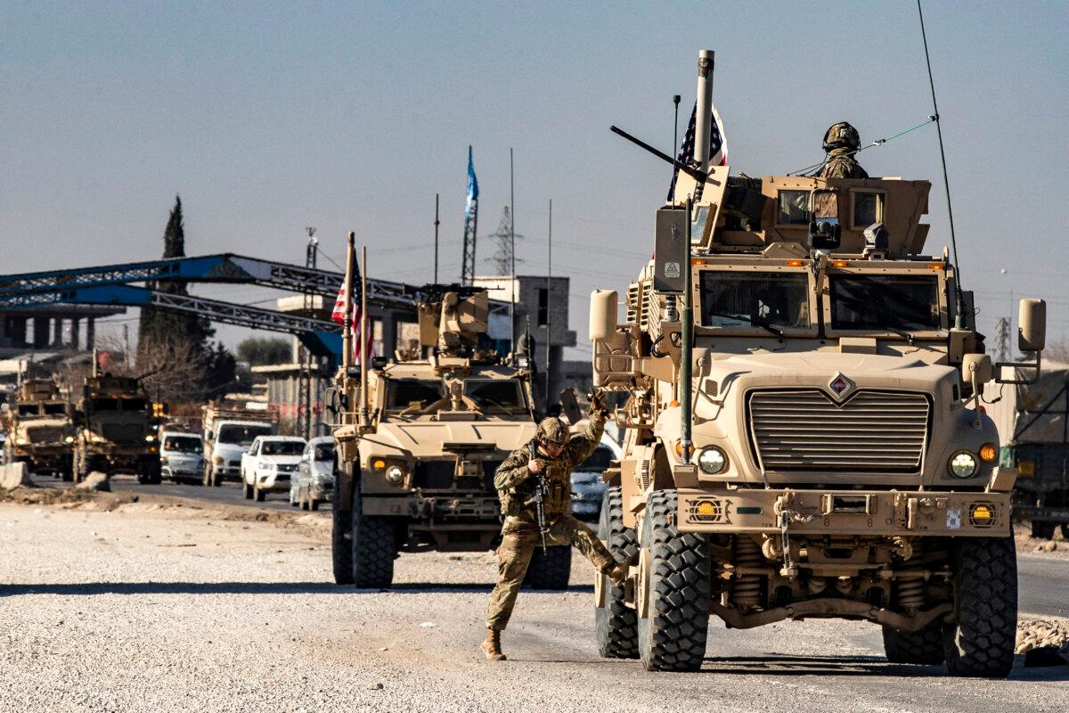 US-Backed Kurdish Group, Damascus Agree to Cease-Fire in Northern Syria 2 U.S. forces on patrol in Syria's city of Qamishli in the Hasakeh province, which is mostly controlled by the Kurdish-led Syrian Democratic Forces, on Jan. 9, 2025. (Delil Souleiman/AFP via Getty Images)