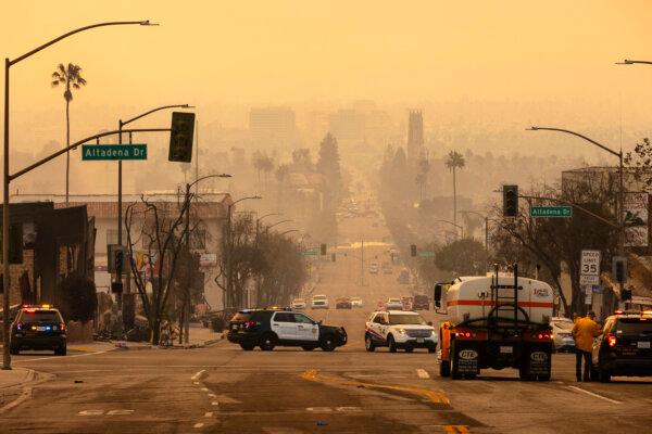 Smoke from the Eaton Fire blankets the air of Altadena, Calif., on Jan. 9, 2025. (Zoë Meyers/AFP via Getty Images)