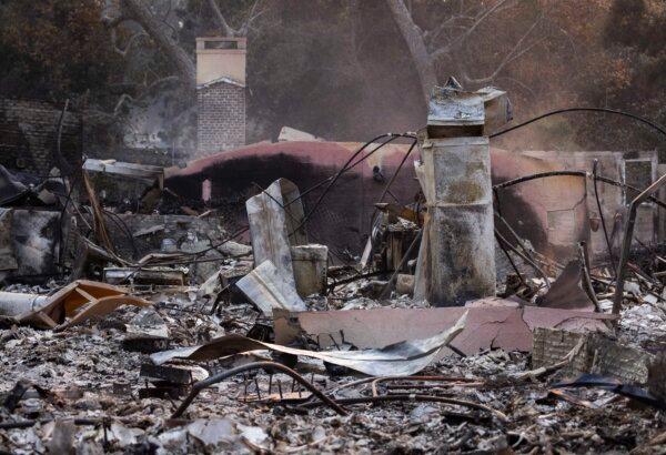 A building destroyed by the Palisades Fire near Los Angeles on Jan. 8, 2025. (John Fredricks/The Epoch Times)