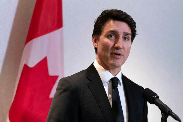 Prime Minister Justin Trudeau speaks to the media after a meeting with the President and CEO of The National Association of Manufacturers Jay Timmons in Washington on Jan. 9, 2025. (The Canadian Press/AP, Jose Luis Magana)