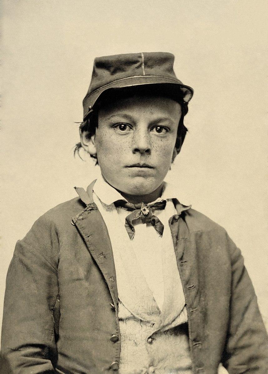 This unidentified young soldier wears a Confederate infantry uniform. He and other teenage boys joined, fought, and suffered in the Civil War. (Public Domain)<span style="color: #ff0000;"> </span>