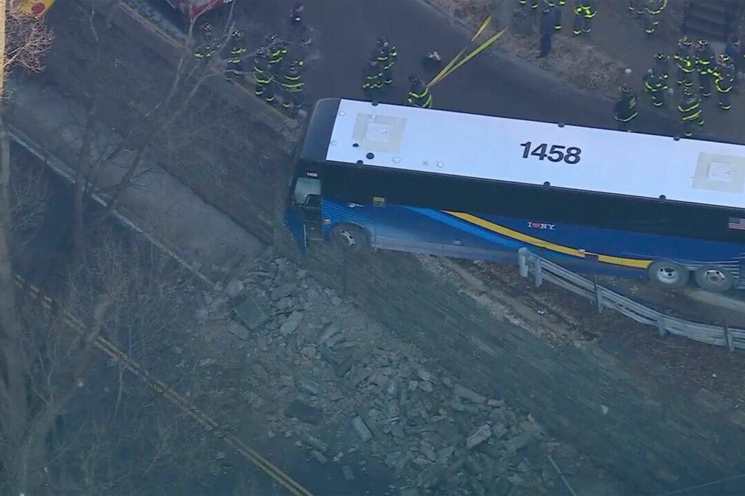 Front of NYC Bus Left Hanging Near Bronx Overpass After Accident