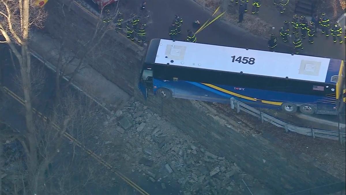 Front of NYC Bus Left Hanging Near Bronx Overpass After Accident