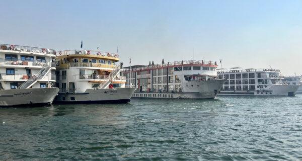 Nile cruise boats line up alongside each other during stops to visit temples along the route from Luxor to Aswan. Cruisers then must step from boat to boat to reach the shore, where they find large crowds also trying to see the temples. People who don’t want to go through this can simply drive the same route in a taxi, stopping as they please, rather than taking the cruise. Taken March. 2023. (Marla Jo Fisher/Orange County Register/TNS)
