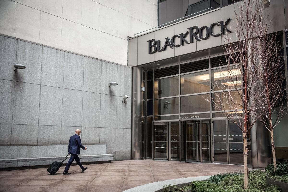 A man walks into the BlackRock offices in New York City on Jan. 16, 2014. (Andrew Burton/Getty Images)