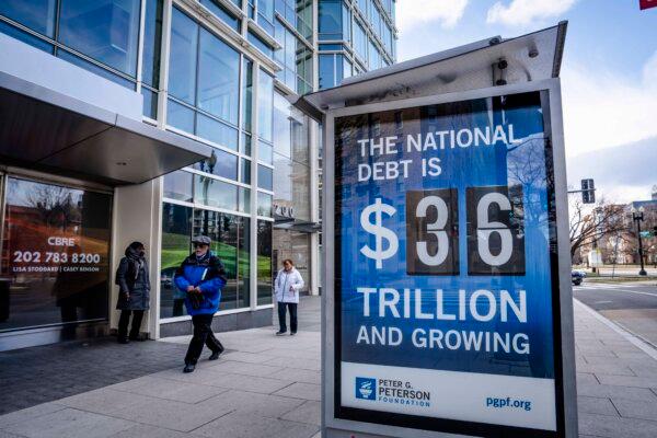 The national debt clock displayed at a bus station in Washington on Jan. 2, 2025. (Madalina Vasiliu/The Epoch Times)