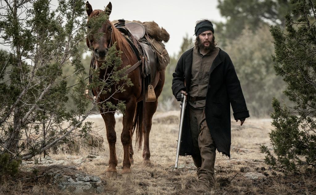 Isaac Reed (Taylor Kitsch), a skilled mountain man, in "American Primeval." (Netflix)