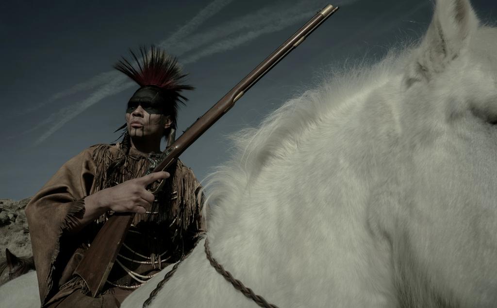 Red Feather (Derek Hinkey), a Shoshone warrior, in "American Primeval." (Netflix)