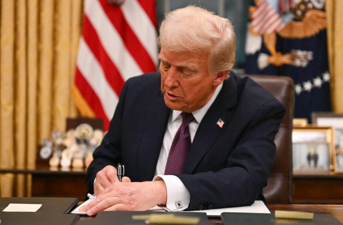 President Donald Trump signs an executive order on birthright citizenship at the White House in Washington on Jan. 20, 2025. (Jim Watson/Pool/AFP via Getty Images)