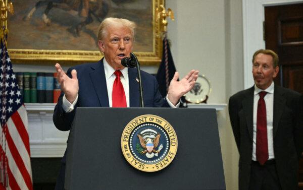Larry Ellison, executive charmain of Oracle, listens to President Donald Trump speak in the Roosevelt Room at the White House on Jan. 21. (Jim Watson/AFP via Getty Images)