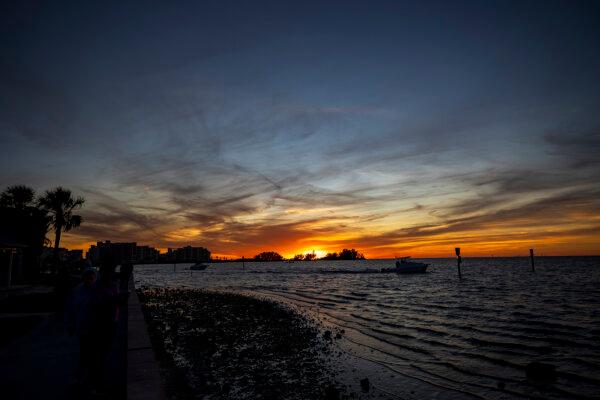 The sun sets over the Gulf Coast as seen from Robert J. Strickland Memorial Park in Hudson, Fla., on Jan. 1, 2025. (Patrick Connolly/Orlando Sentinel/TNS)