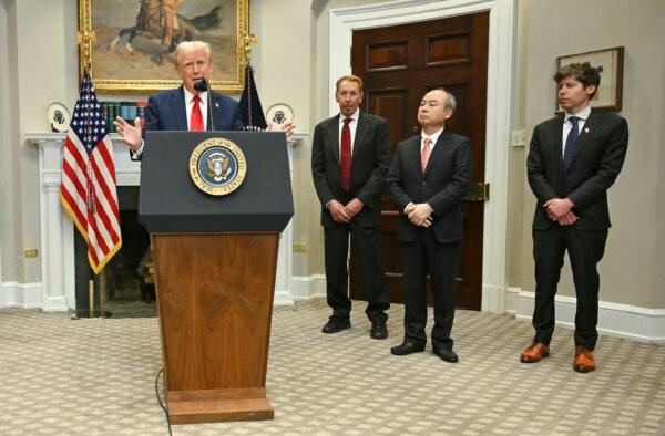President Donald Trump speaks in the Roosevelt Room flanked by Masayoshi Son (2R), chairman and CEO of SoftBank Group Corp., Larry Ellison (2L), executive chairman of Oracle, and Sam Altman (R), CEO of Open AI, at the White House in Washington, on Jan. 21, 2025. (Jim Watson/AFP via Getty Images)