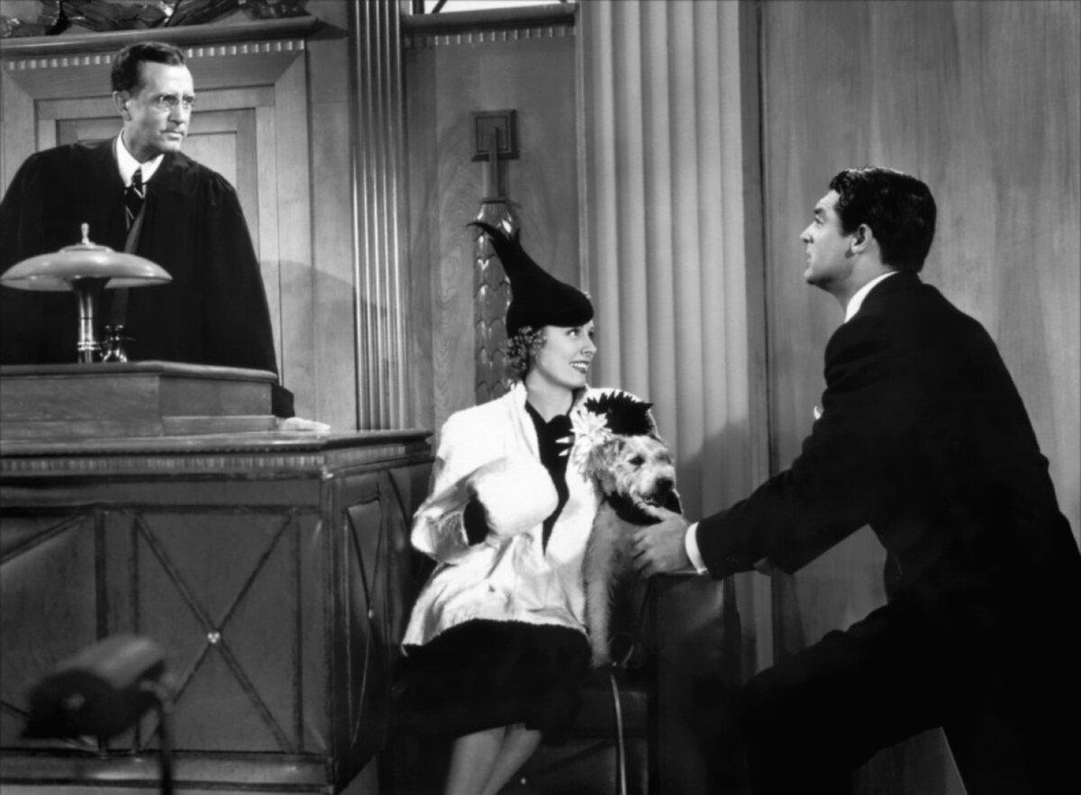 (L–R) The Judge (Paul Stanton), Lucy Warriner (Irene Dunne), and Jerry Warriner (Cary Grant) have the hearing, in “The Awful Truth.” (Columbia Pictures/MovieStillsDB)
