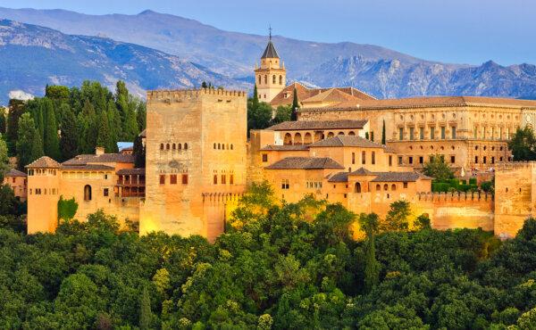 Alhambra is perched on a rocky hill—a fortress surrounded by Sierra Nevada mountains. Alhambra’s name comes from an Arabic word meaning “red castle,” derived from the red stones on the towers and walls surrounding the compound. (Dreamstime/TNS)