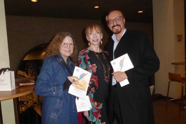 Laura Ainsworth (C) and Pat Reeder (R), along with Laura's sister Julianne Thorne (L), watched Shen Yun Performing Arts at the Music Hall at Fair Park in Dallas, Texas, on Jan. 25, 2025. (Frank Liang/The Epoch Times)
