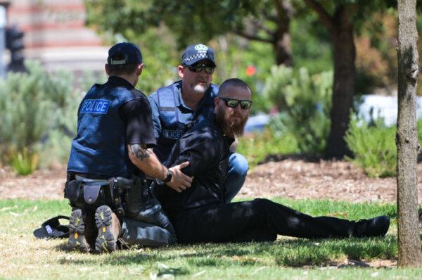 A member of the National Socialist Network (NSN) is arrested during a counter protest on North Terrace and East Terrace in Adelaide, Australia on Jan. 26, 2025. (Tracey Nearmy/Getty Images)