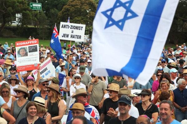 Protestors hold placards and flags during a rally against antisemitism in Sydney, Australia, on Feb. 18, 2024. (Lisa Maree Williams/Getty Images)