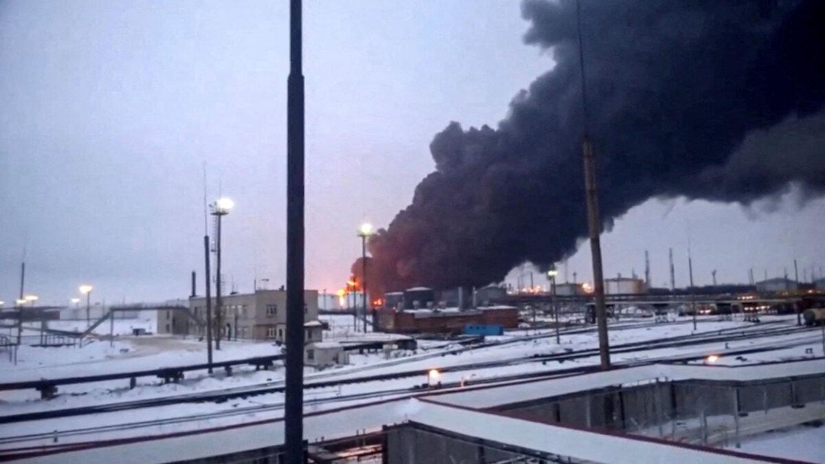 Smoke rises after Ukraine's intelligence service stages a drone strike on an oil refinery in the western Ryazan region, Russia, on March 13, 2024. (Screen grab from a video obtained by Reuters)