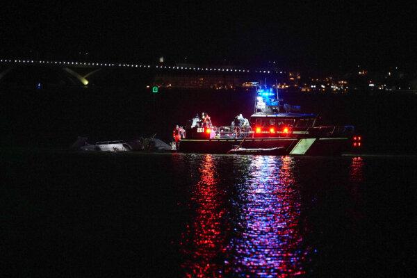 Emergency response units respond to helicopter wreckage in the Potomac River near Ronald Reagan Washington Airport in Arlington, Va., on Jan. 29, 2025. (Andrew Harnik/Getty Images)