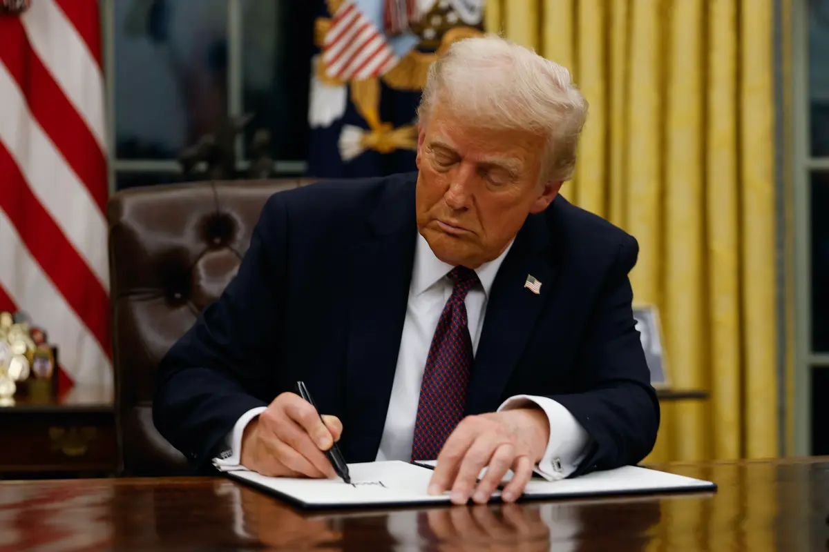 President Donald Trump signs executive orders in the Oval Office of the White House on Jan. 20, 2025. (Anna Moneymaker/Getty Images)