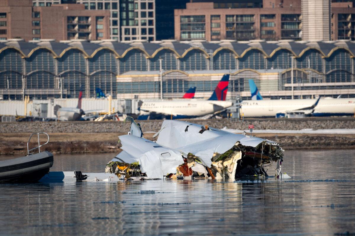 The U.S. Coast Guard investigates aircraft wreckage after a midair collision over the Potomac River near Washington, on Jan. 30, 2025. (Brandon Giles/U.S. Coast Guard via Getty Images)