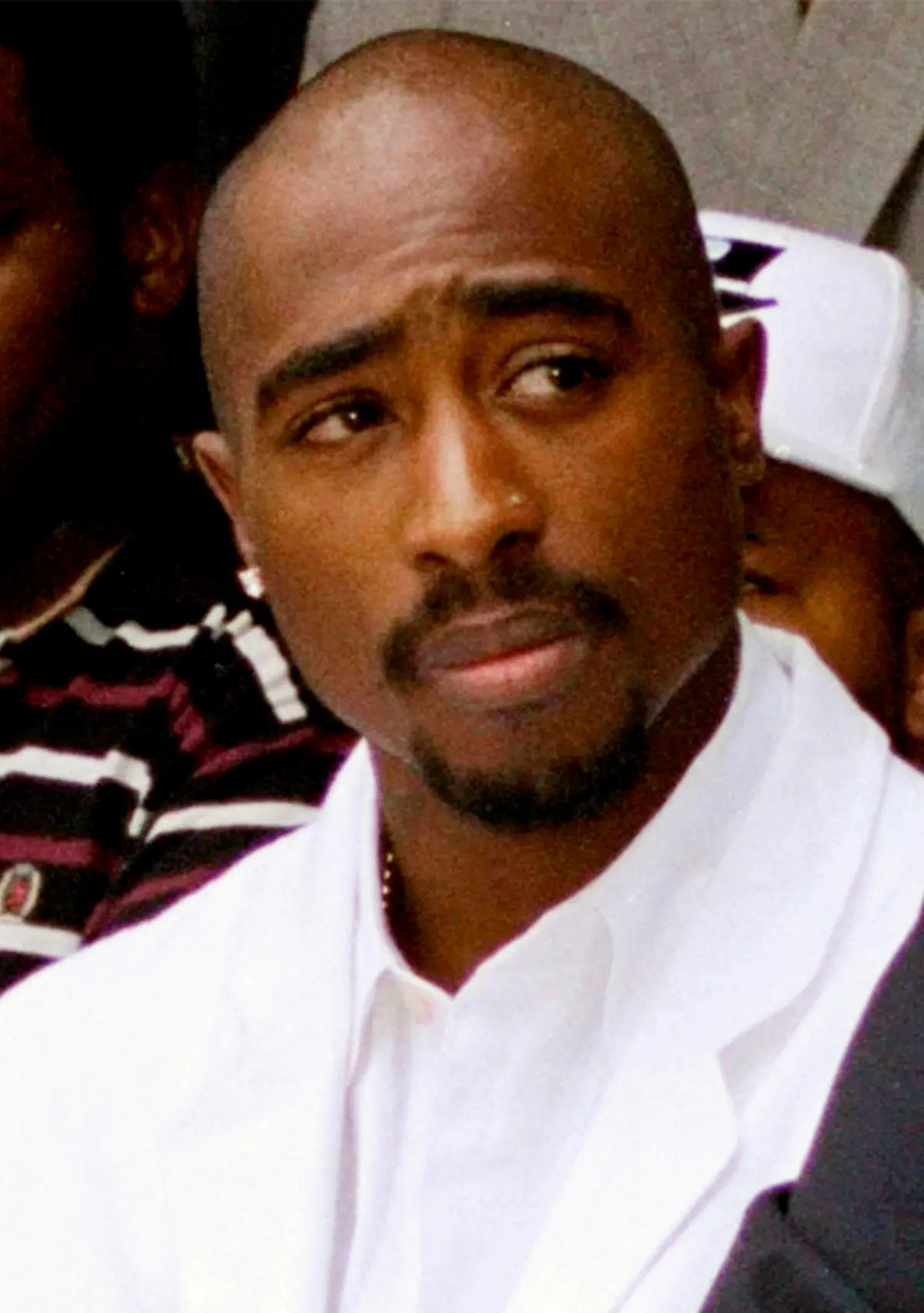 Rapper Tupac Shakur attends a voter registration event in South Central Los Angeles on Aug. 15, 1996. (Frank Wiese/AP)