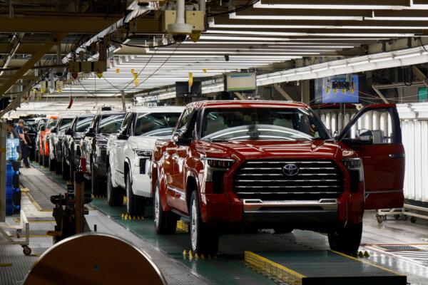 Tundra trucks and Sequoia SUVs exit the assembly line as finished products at Toyota's truck plant in San Antonio, Texas, on April 17, 2023. (Jordan Vonderhaar/Reuters)