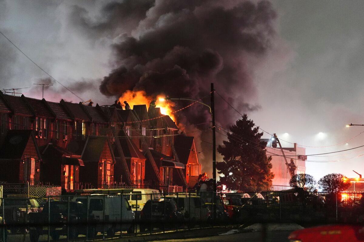 First responders work the scene after a small plane crashed in Philadelphia on Jan. 31, 2025. (Matt Rourke /AP Photo)