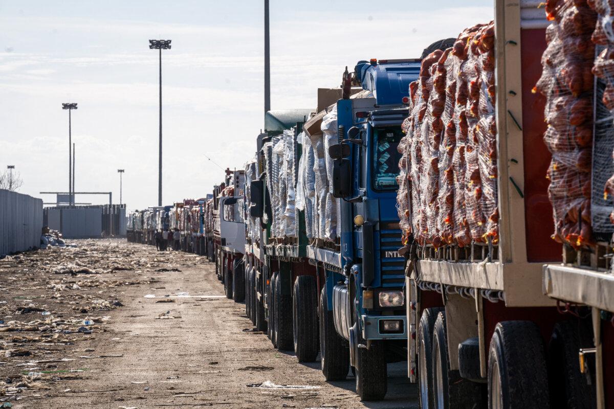 Trucks carrying aid are waiting in front of the Rafah crossing to enter the Gaza Strip in Rafah, Egypt, on Feb. 1, 2025. The transportation of patients from two hospitals in the north and south of Gaza will be coordinated with the World Health Organisation and monitored by the EU. (Ali Moustafa/Getty Images)