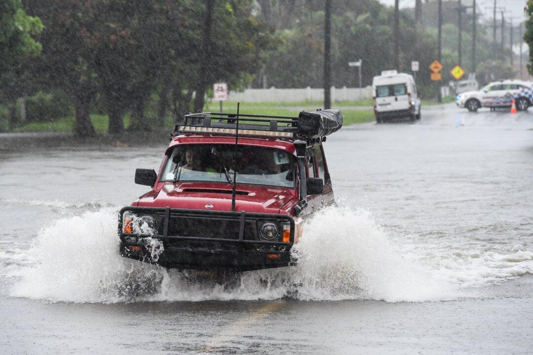 1 Dead as North Queensland Deluge Continues