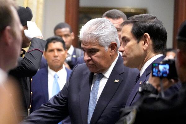 Panama's President Jose Mulino (L) and U.S. Secretary of State Marco Rubio arrive for a meeting at the presidential palace in Panama City on Feb. 2, 2025. (Mark Schiefelbein, Pool/AP Photo)