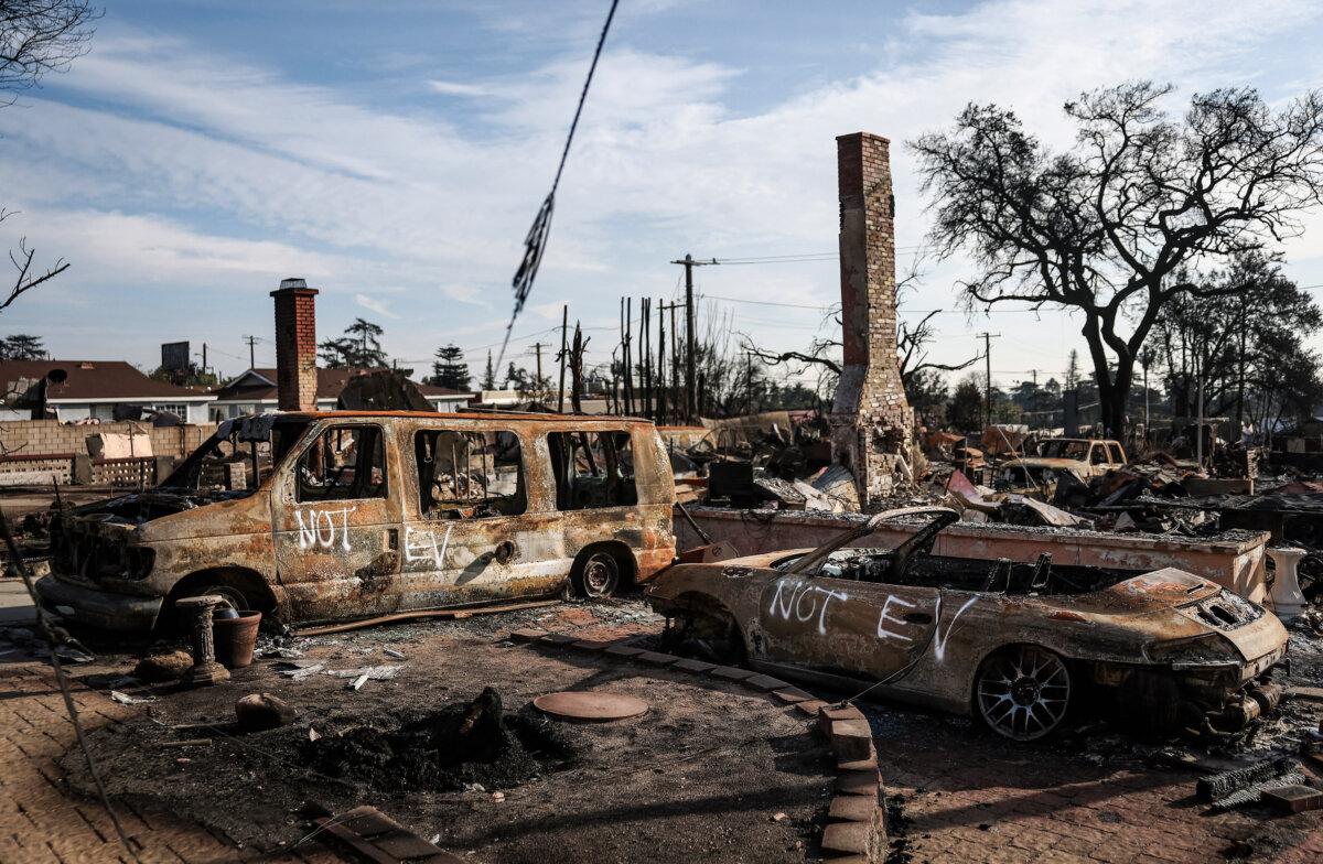 Vehicles that burned in the Eaton Fire are marked "NOT EV" to show they are not electrical amid EPA hazardous materials disposal in Altadena, Calif., on Jan. 31, 2025. (Mario Tama/Getty Images)