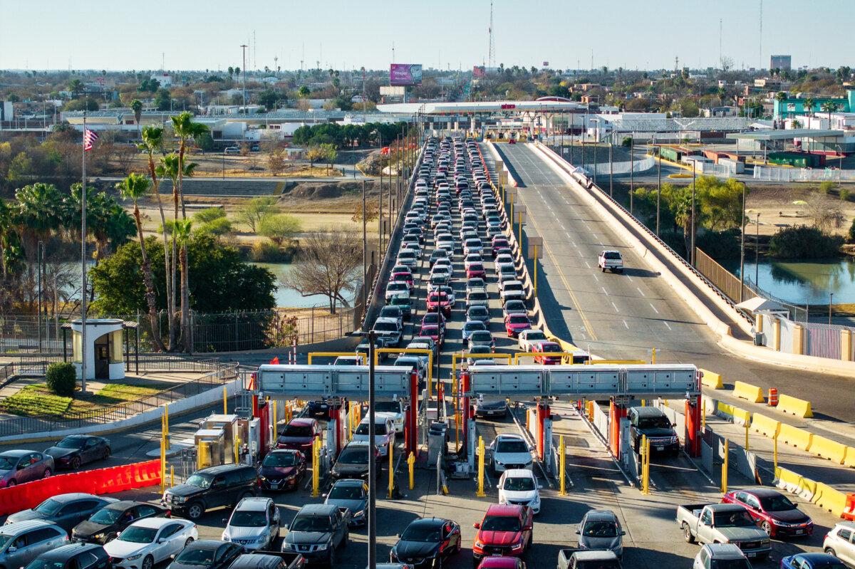 Vehicles sit in traffic while waiting to cross the U.S.–Mexico border in Laredo, Texas, on Feb. 3, 2025. (Brandon Bell/Getty Images)