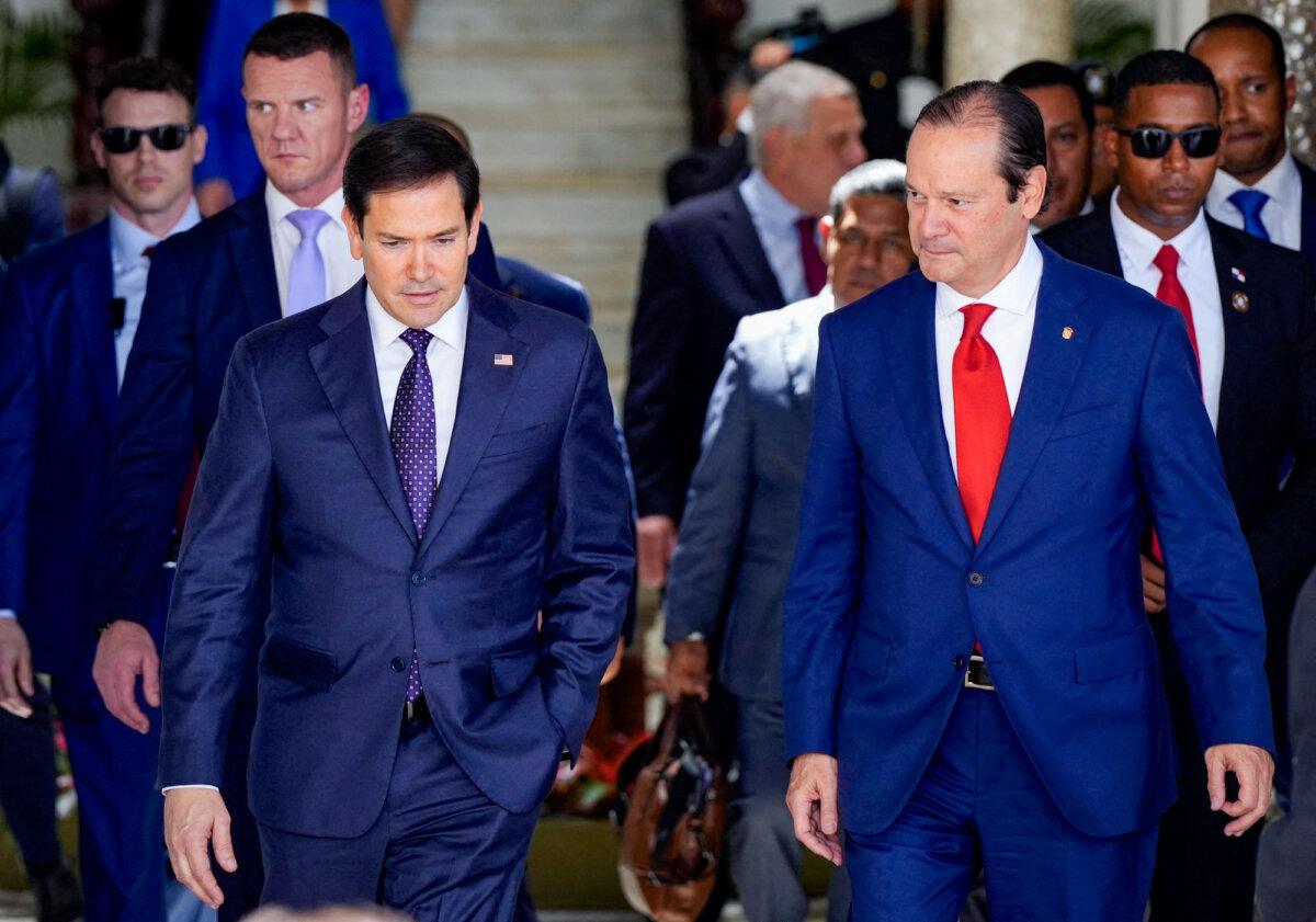 Panama's Foreign Minister Javier Martinez-Acha (R) walks next to U.S. Secretary of State Marco Rubio after their meeting at the presidential palace in Panama City on Feb. 2, 2025. (Arnulfo Franco/AFP via Getty Images)