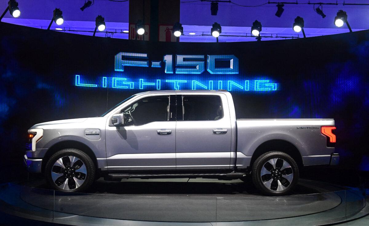 The all-electric F-150 Lightning from Ford is displayed at the Los Angeles Auto Show in California, on Nov. 18, 2021. (Frederic J. Brown/AFP via Getty Images)