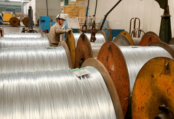 A worker handles steel cables at a factory in Nantong in eastern China's Jiangsu Province on July 3, 2018. (AFP/Getty Images)
